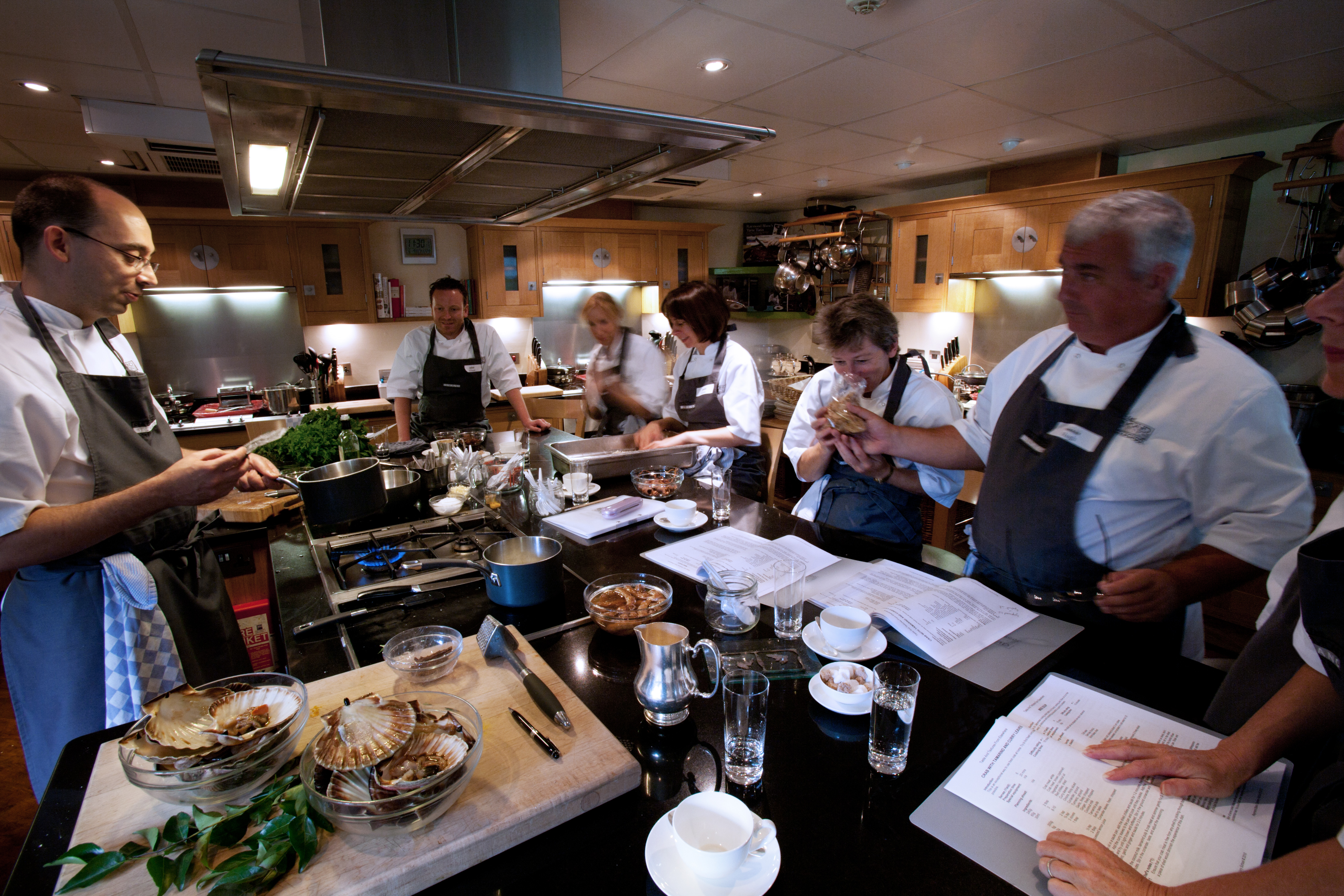 Cooking class preparation checklist featuring recipe notes, fresh ingredients, and essential kitchen tools