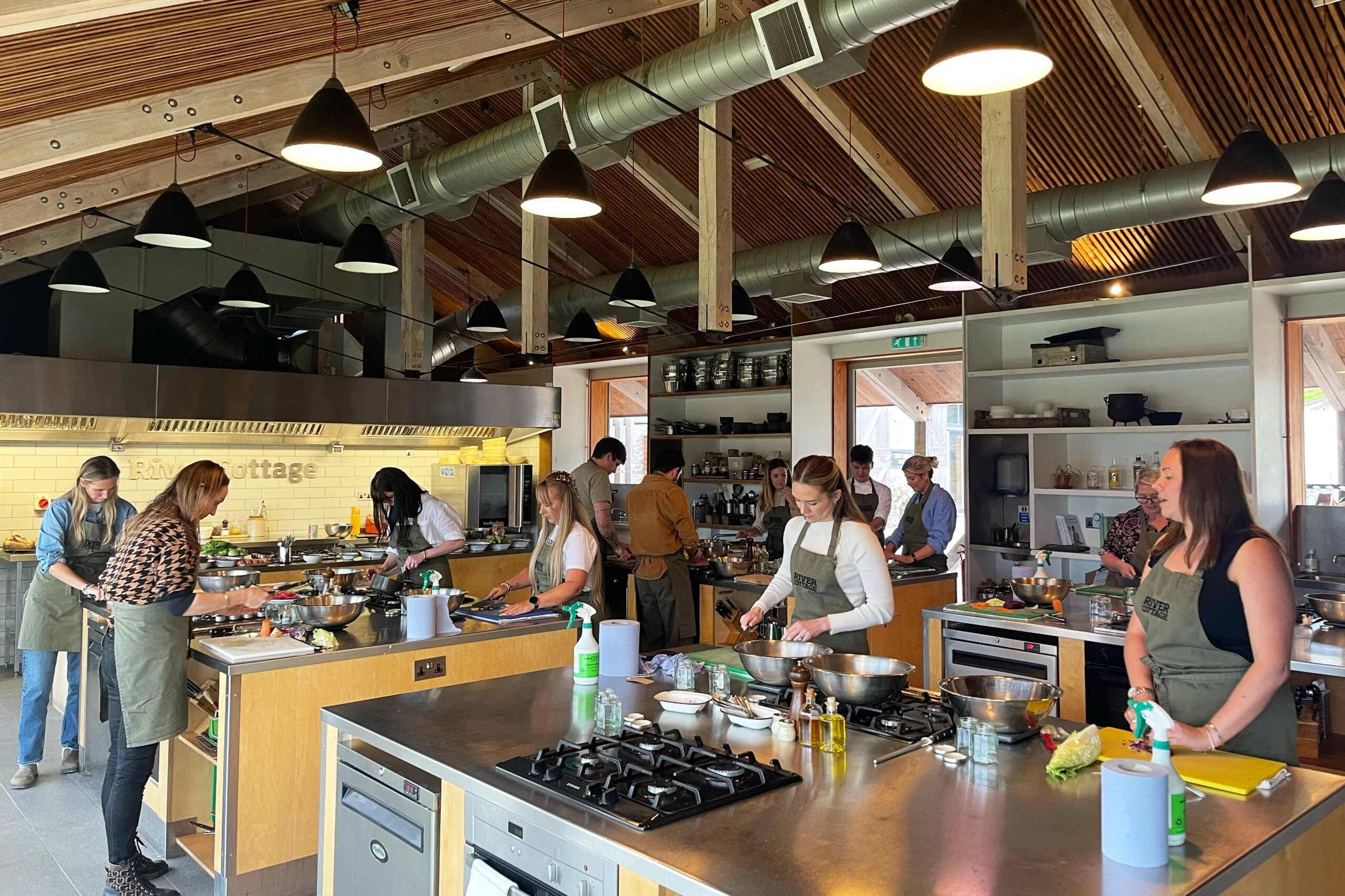 Organized cooking workshop with preparation stations, fresh produce, and space for hands-on culinary lessons